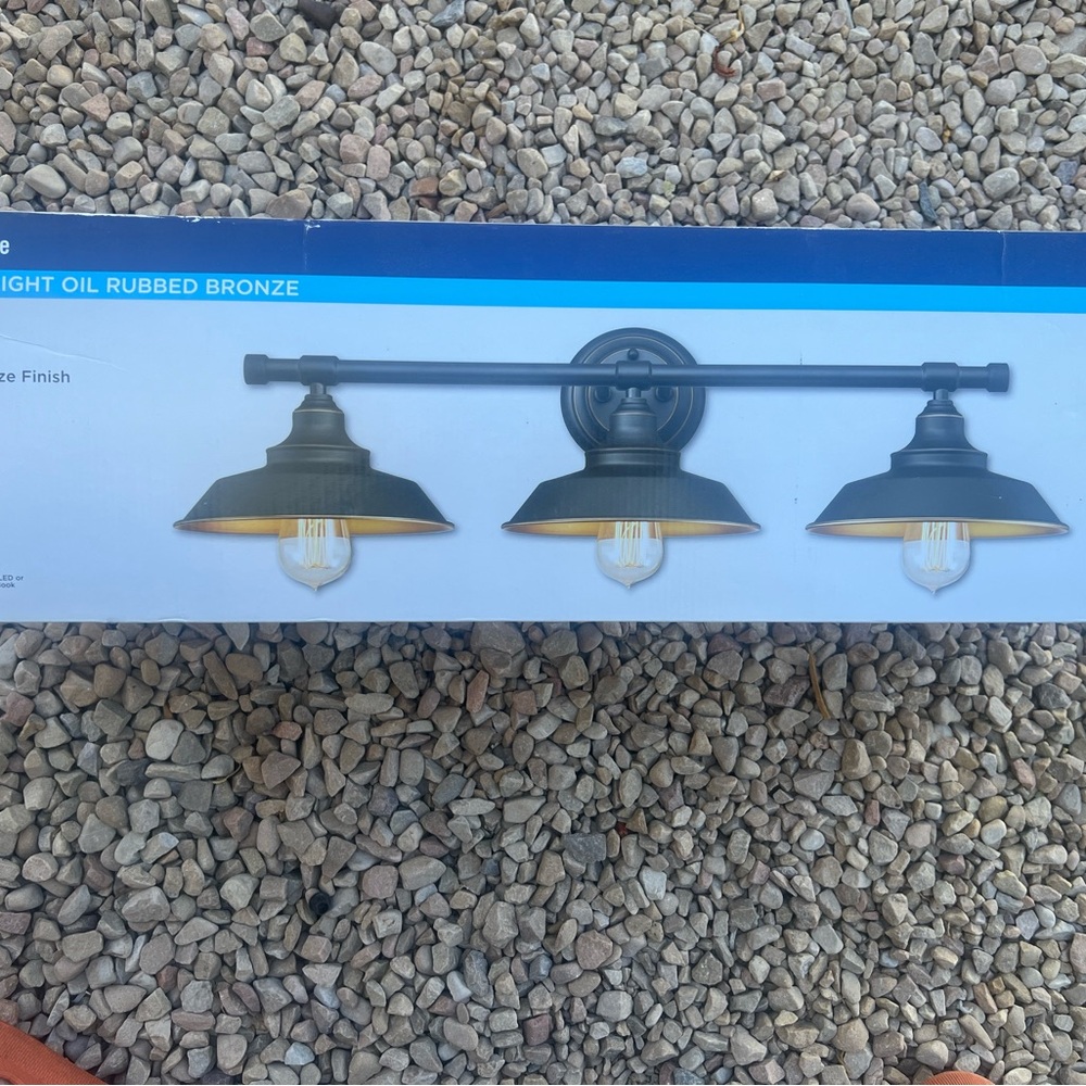 Brand new wall vanity light. Oil rubbed bronze. $60